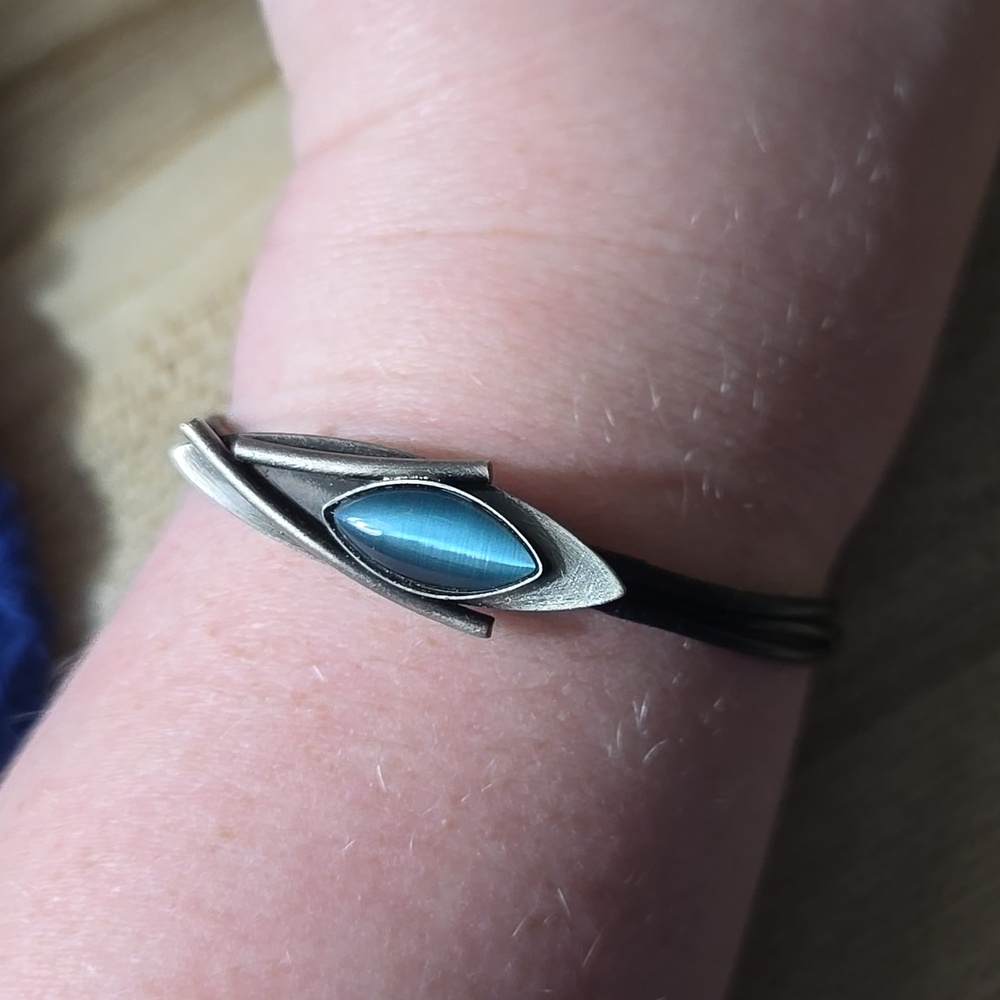 Christophe poly artisan blue stone and silver tone bracelet with black cord